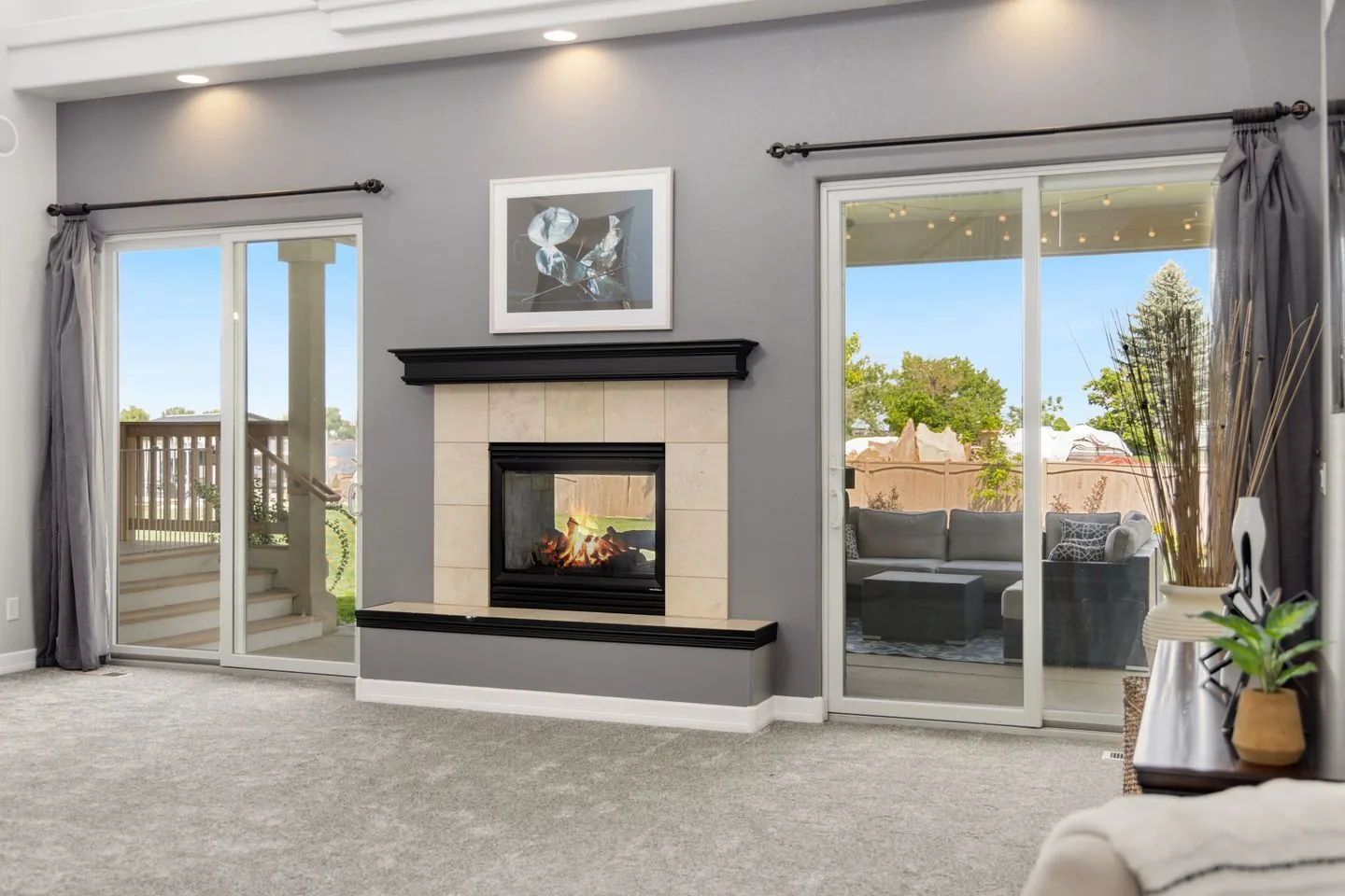Living room with doors opening onto an outdoor patio