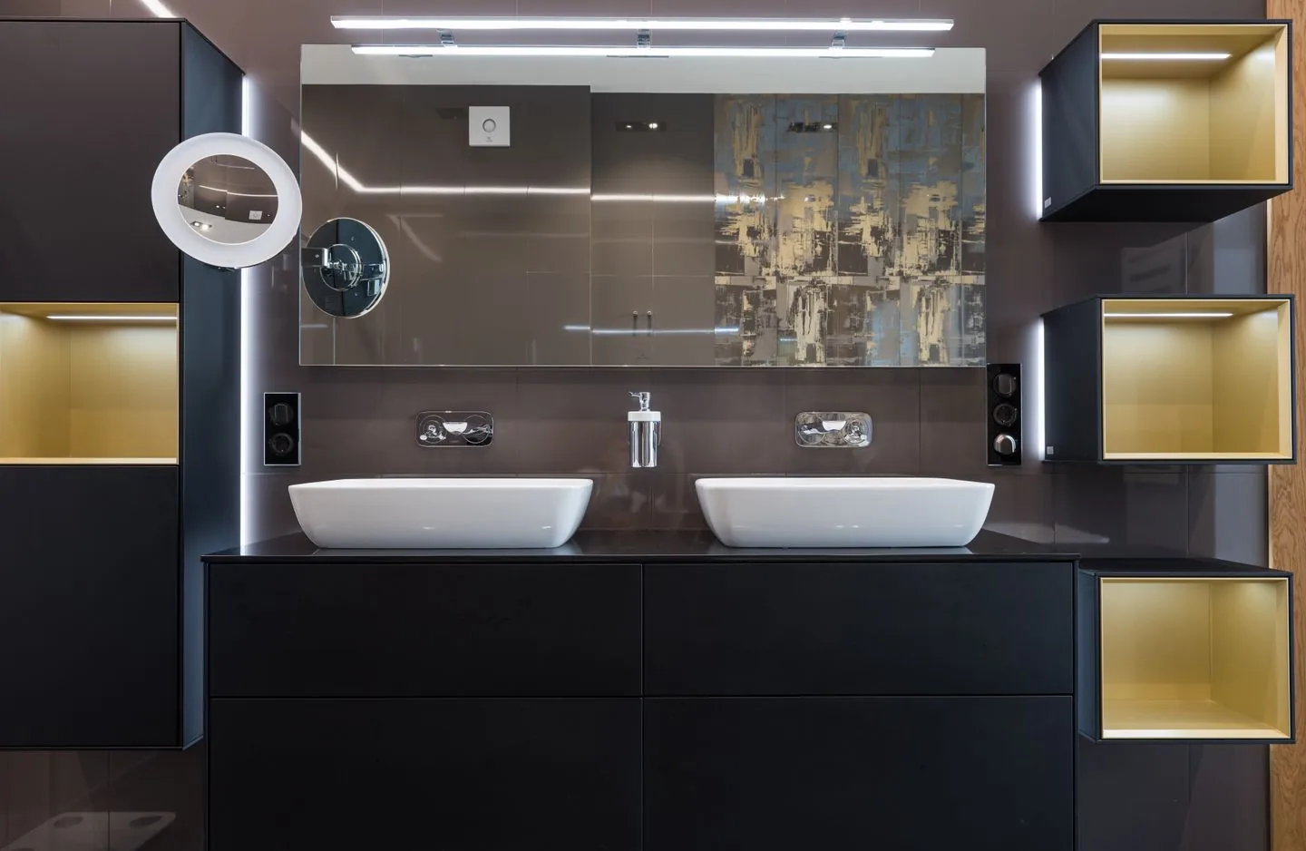 Two bathroom basins with separate storage areas