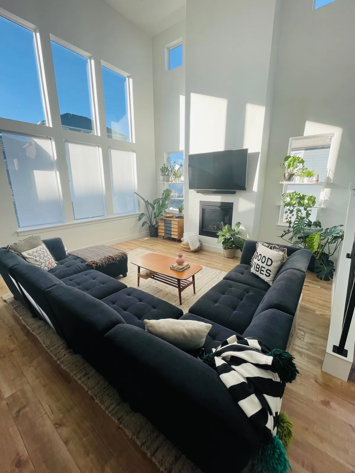 Tall windows and high ceilings above a seating area
