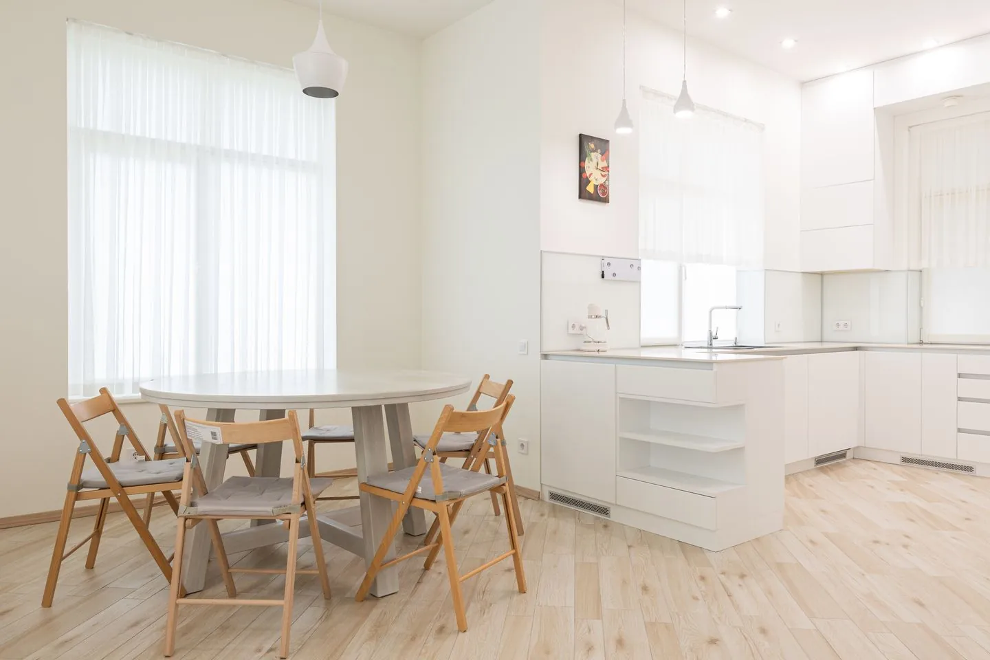 Dining table and chairs with clear space around them